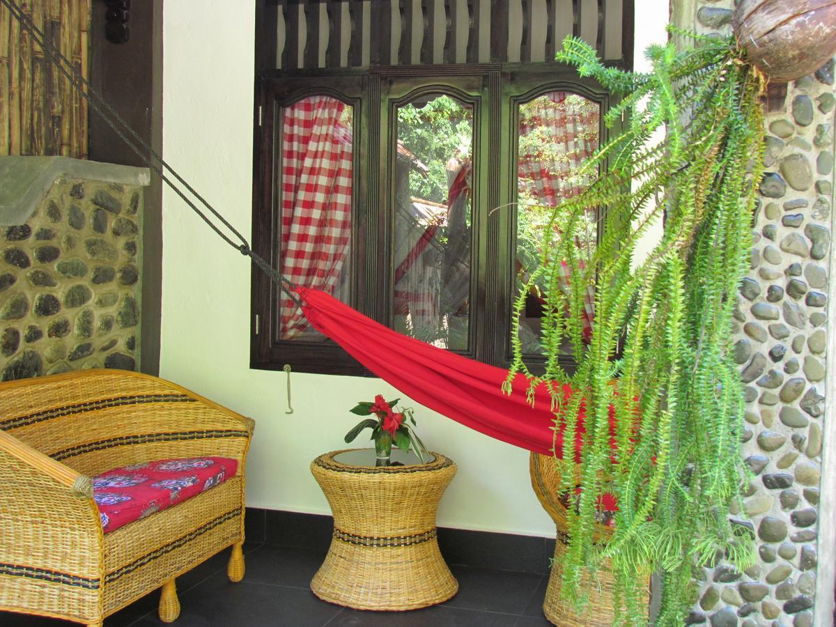 Ecotravel Cottages Букит Лаванг Екстериор снимка