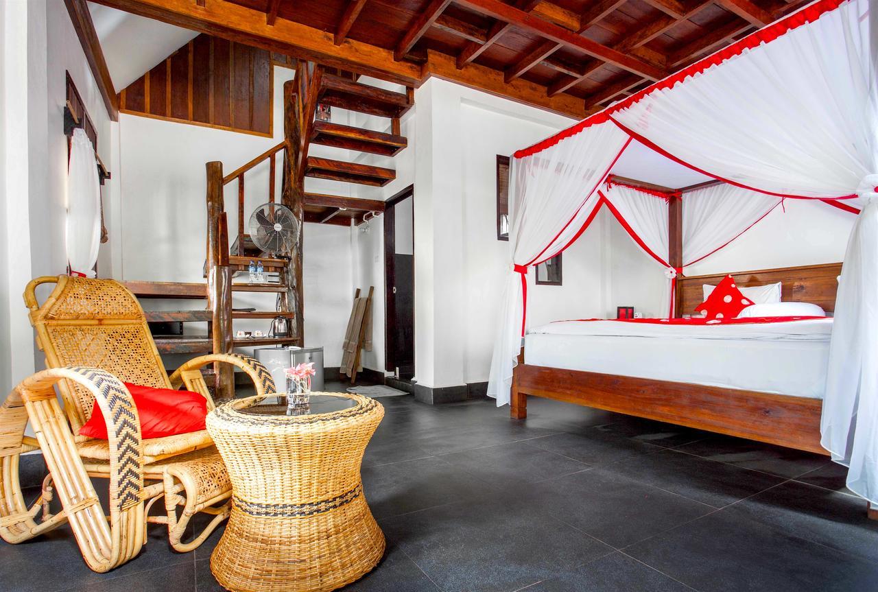 Ecotravel Cottages Букит Лаванг Екстериор снимка